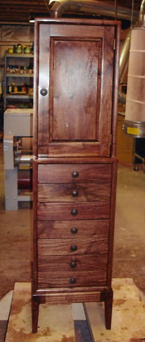Here's a handsome walnut jewelry cabinet Ronald Frey made with help from his Woodmasters.